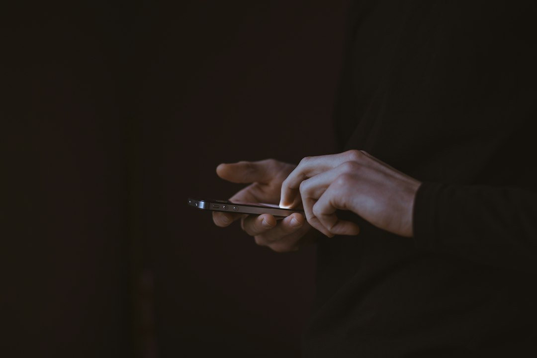 Silhouette of a person holding a phone, mistakes to avoid with angry birds pick up lines